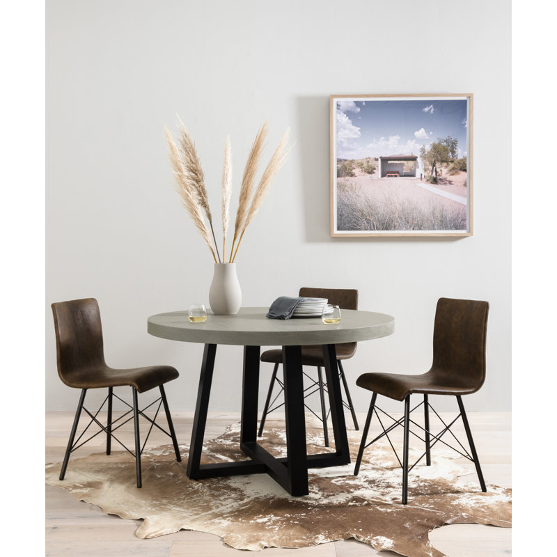 Harland Cowhide Animal Print Area Rug in Ivory