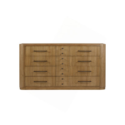 La commode et la commode avec une finition en bois et des poignées en métal minces combinent une fonctionnalité modulaire avec un style rustique moderne pour le rangement de la chambre à coucher
