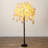 5ft. Lighted Artificial Cascading Cherry Blossom Tree with 320 Warm White LED Lights