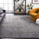 Riebe Abstract Black/Silver Area Rug
