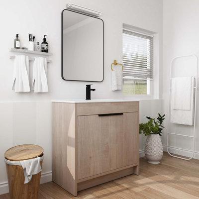 Meuble-lavabo autoportant avec lavabo en céramique et 2 portes d'armoire à fermeture en douceur