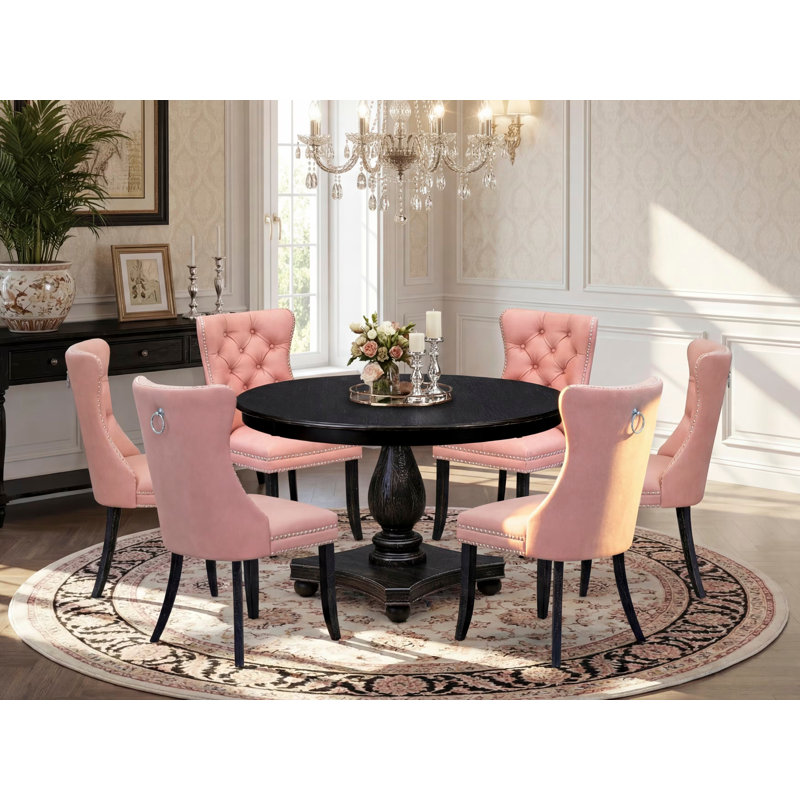 L'ensemble de salle à manger 7 pièces contient une table de cuisine ronde de 48 po avec piédestal et des chaises Parson en polyester, noir sablé