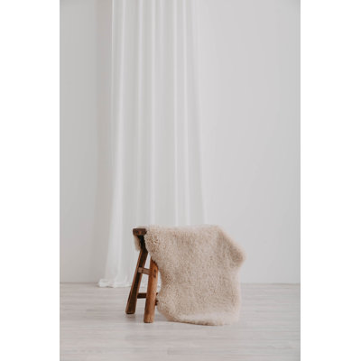 Single pelt shorn curly sheepskin rug
