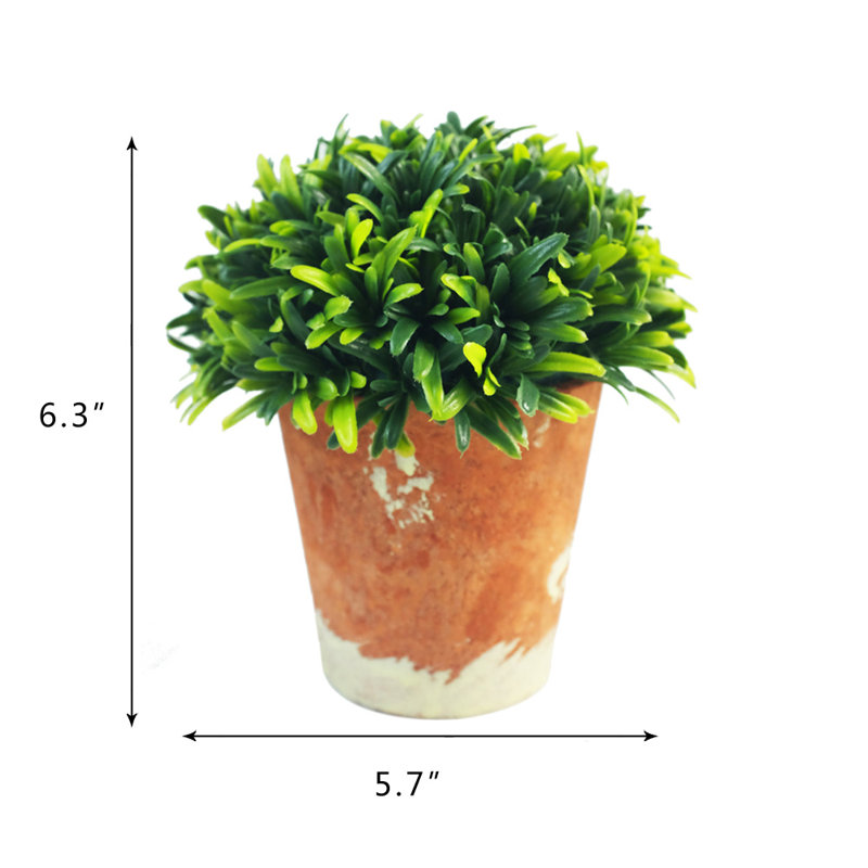 Plante artificielle en pot rustique