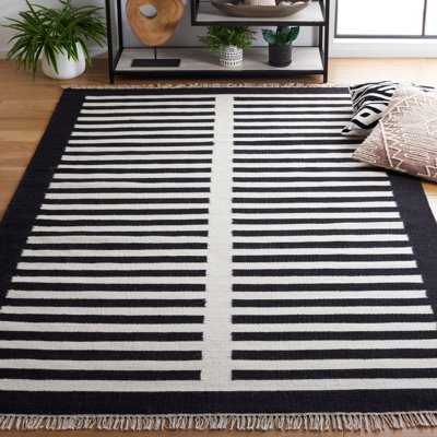 Delia Ivory/Black Area Rug