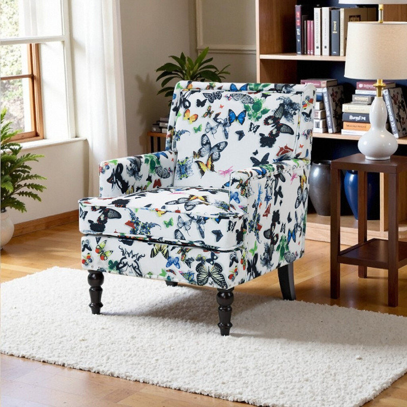 Fauteuil d'appoint rembourré avec garniture cloutée, structure en bois massif et rembourrage moelleux pour le décor du salon