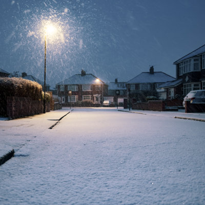 Snow Covered Residential Road by Ellenmoran