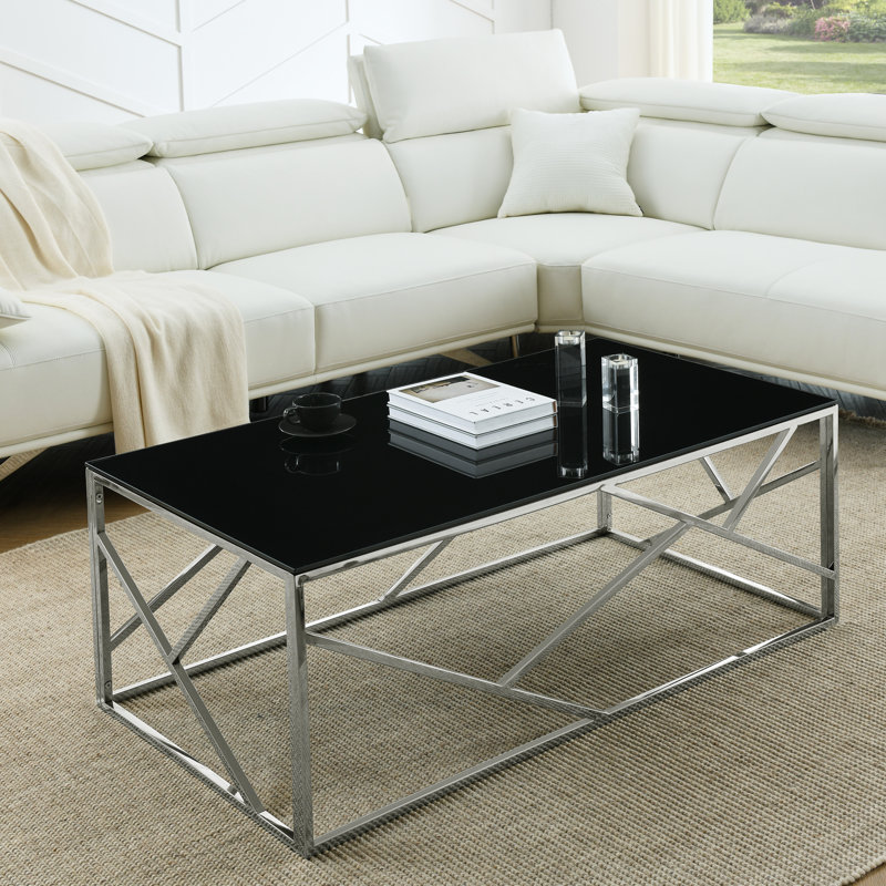 Table basse élégante et moderne avec plateau en verre trempé et structure en acier inoxydable, parfaite pour le salon et la chambre à coucher