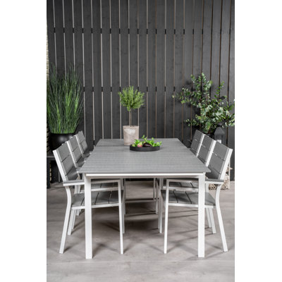 Faiyaz 6 - Person Patio Dining Set with Extendable Rectangular Table
