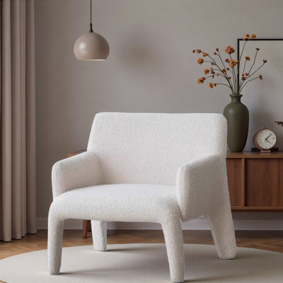 Fauteuil de loisir confortable en velours simple.