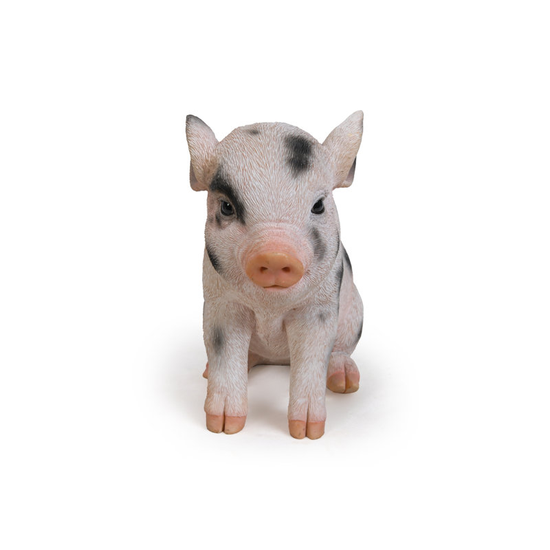 Statue porc de bébé assis, Taches noires