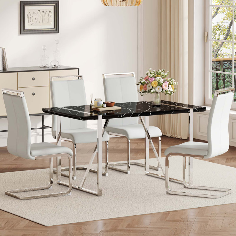Ensemble de table et de chaises.Une table de salle à manger rectangulaire en MDF rustique industriel avec bureau en MDF et pieds en métal argenté électrolytique, avec 4 chaises avec coussin en polyuréthane et pieds en métal.