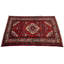 Poock Oriental Area Rug in Red