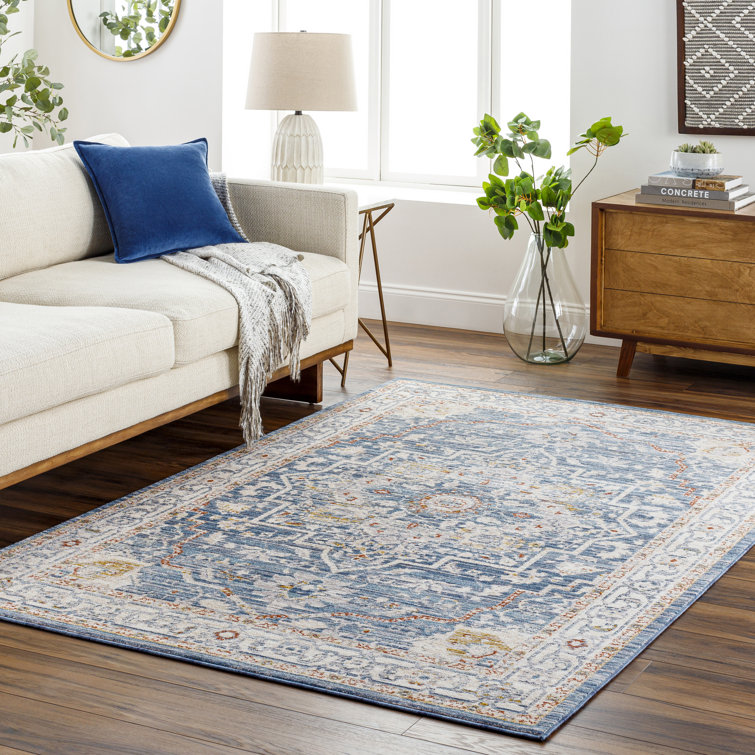 Tapis beige / bleu / rouge