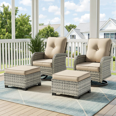 Ensemble de chaises berçantes pivotantes d'extérieur 4 pièces avec coussins et repose-pieds