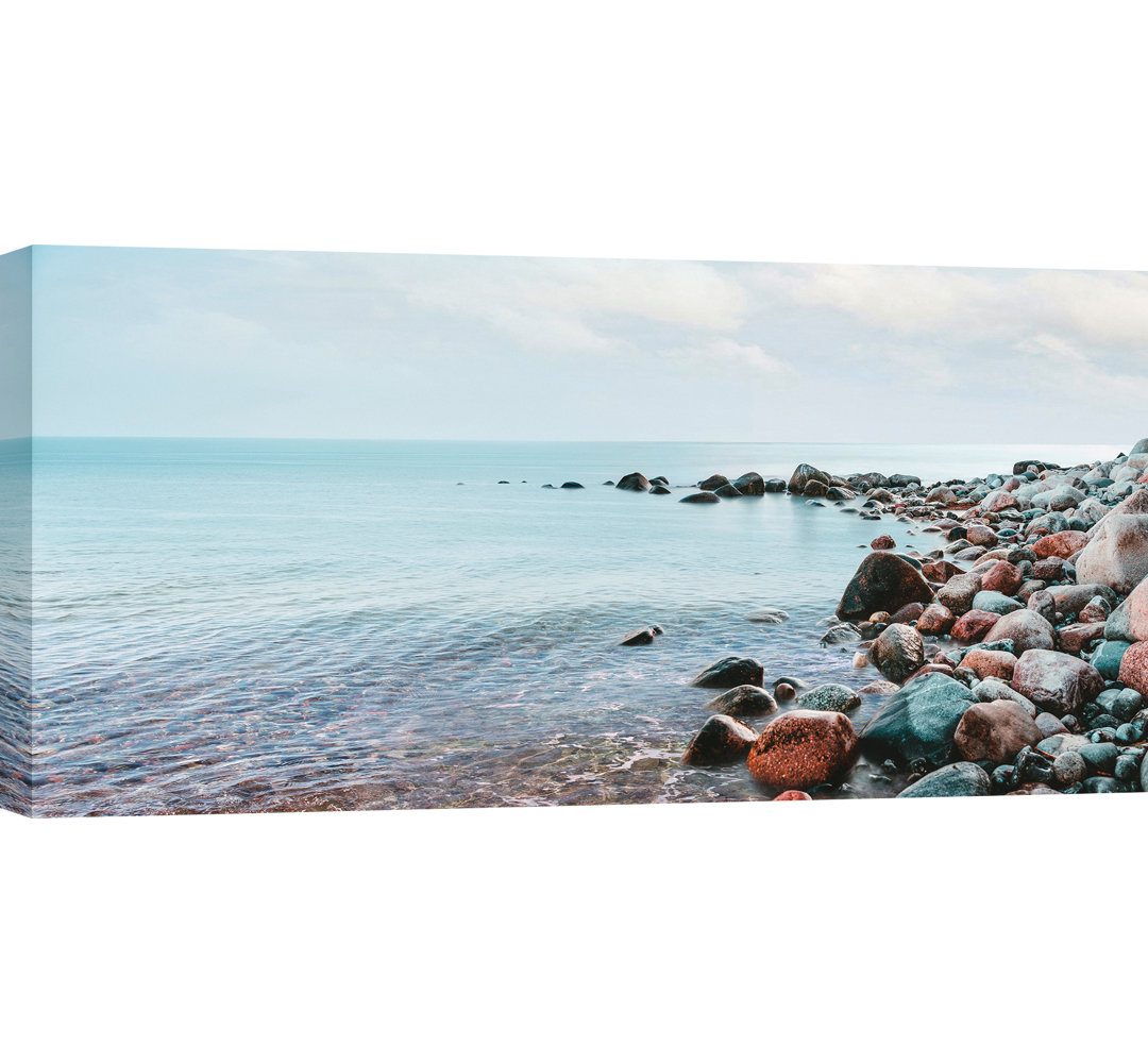 "Kieselsteine am Strand" von Pangea Images