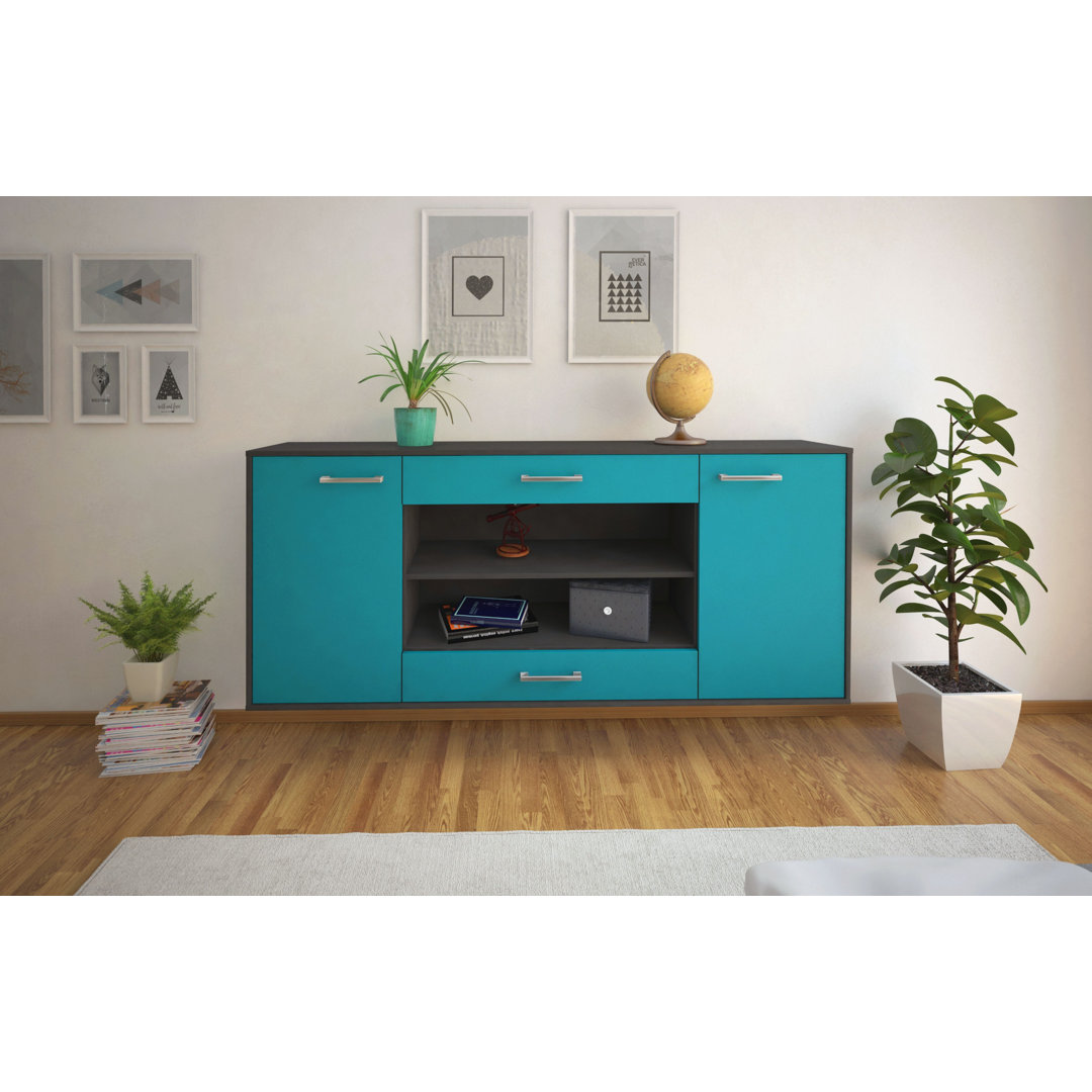 Das Sideboard Mussab hat Metallgriffe. Es hat die Maße 180 cm x 79 cm x 35 cm.