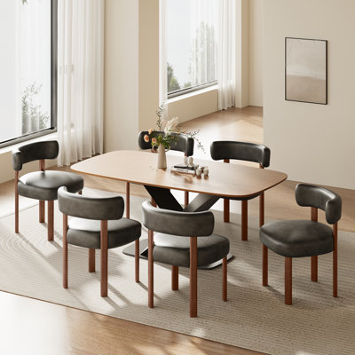 Chaise d'appoint rembourrée en similicuir
