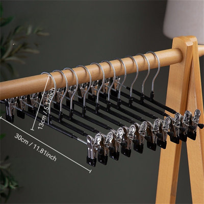 Cintre avec pinces pour pantalons