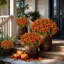 Paquet de 12 fleurs artificielles pour maman - Plantes d'extérieur en soie résistantes aux rayons UV (rouge-orange)