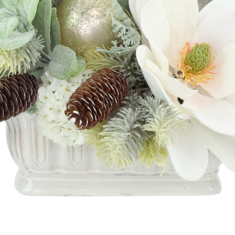 Holiday Centerpiece with Magnolia, Berries and Pinecones
