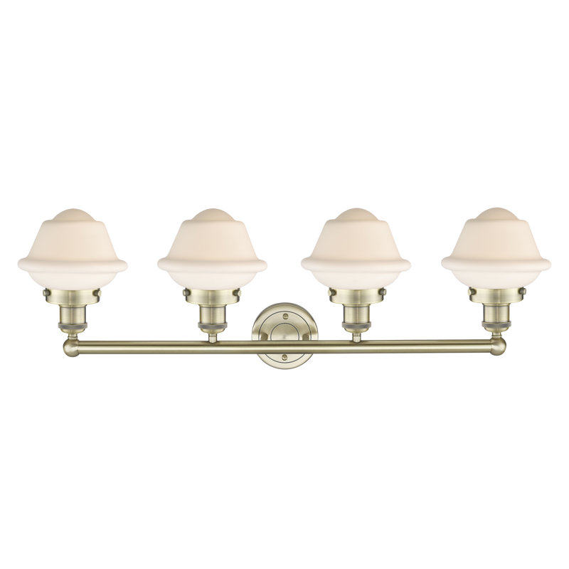 Éclairage pour meuble-lavabo à 4 lumières à intensité variable Grourke, Blanc mat, Antique Brass