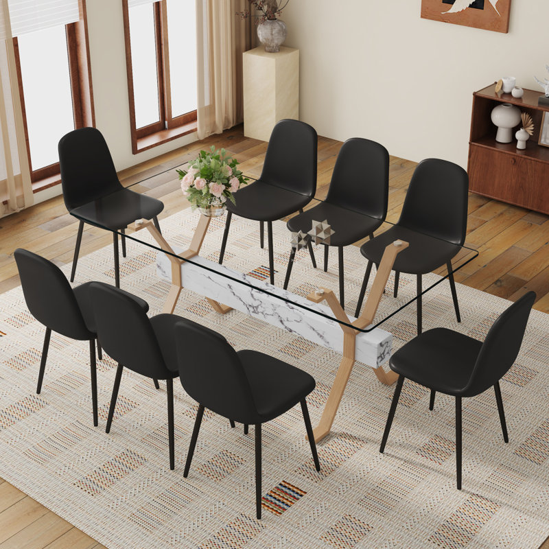 Table de salle à manger transparente en verre trempé avec 8 chaises et pieds en métal. Grande table avec pieds en X en métal