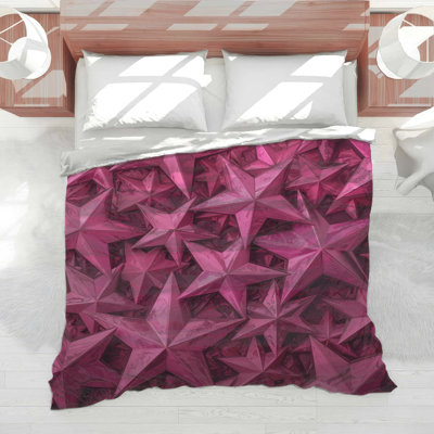 Édredon rose avec étoiles métalliques