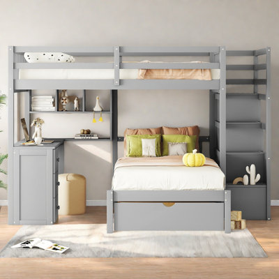 Lit superposé double au-dessus de simple avec bureau, tiroirs et tablettes