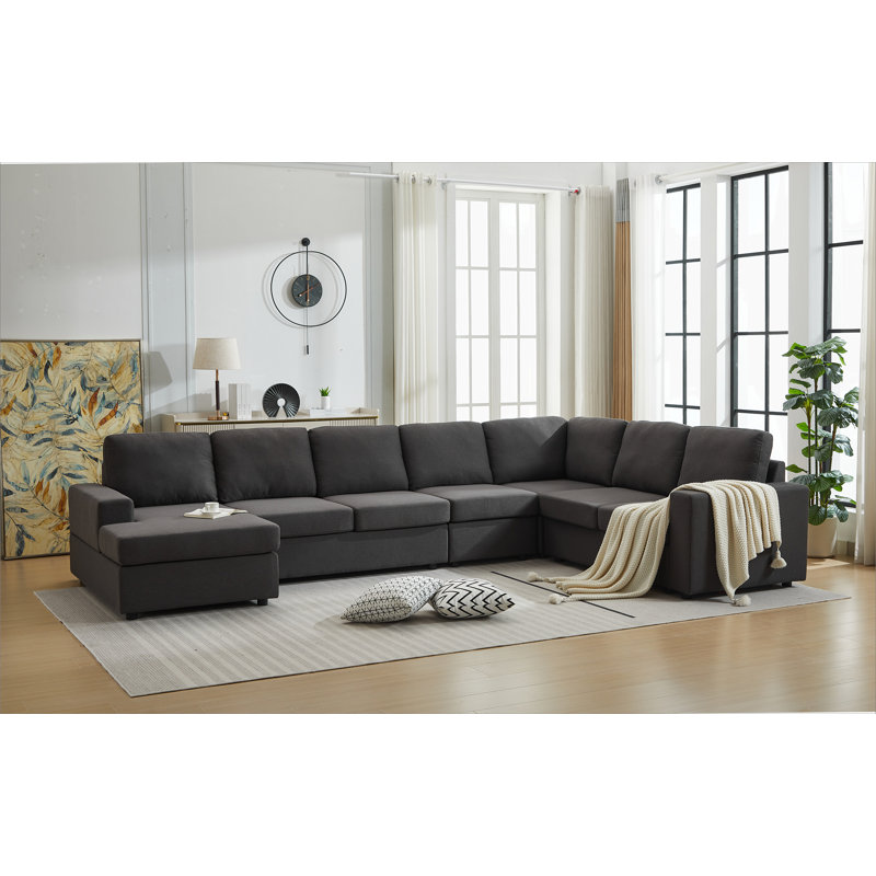 Grand ensemble de canapé modulaire en forme de L avec composants amovibles, revêtement confortable et jetés décoratifs pour les intérieurs contemporains