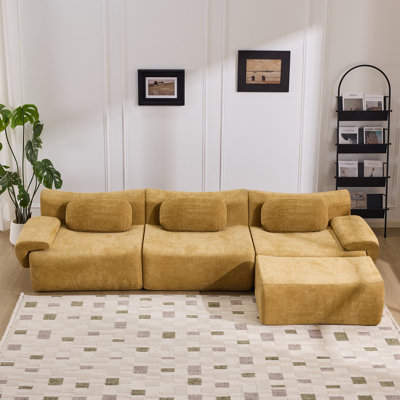 Canapé rembourré avec 3 coussins et repose-pieds