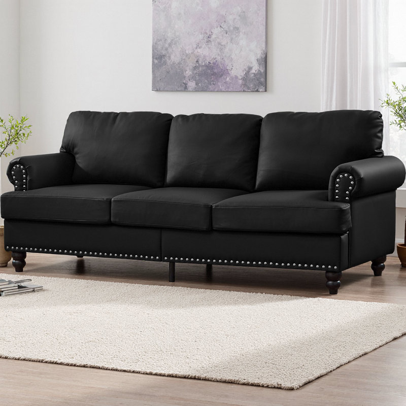 Canapé 83 places moderne en similicuir de 83 po avec garniture cloutée argentée, siège à ressorts, coussins amovibles et rangement dissimulé, pieds en bois massif brun foncé