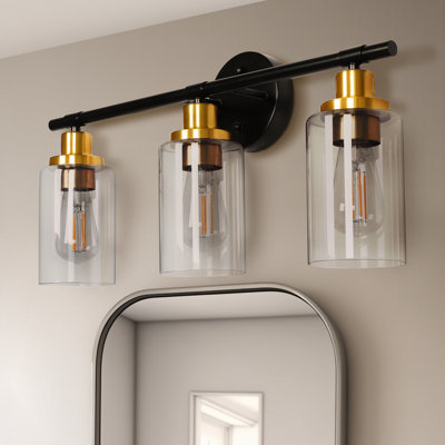 Luminaire de salle de bain moderne noir mat avec abat-jour en verre transparent et douille dorée Sherron
