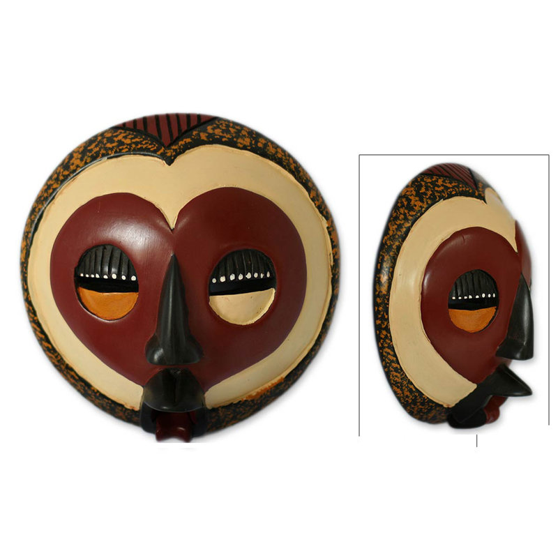 Un bon masque en bois de cœur Mena House