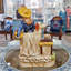 Drum and Dog Figurine