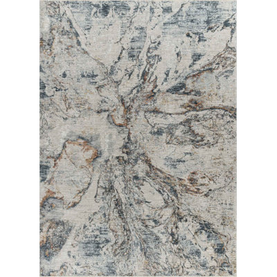 5' X 8' Beige and Blue Abstract Power Loom Area Rug