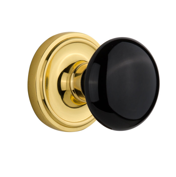 Rosette classique avec bouton de porte en porcelaine noire, 2-3/8 po, Laiton non laqué