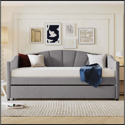 Canapé-lit rembourré de taille simple avec lit gigogne et lattes de bois, parfait pour un espace de couchage supplémentaire et des chambres d'amis