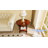 Bunnlevel 24" Tall Oval Wood End Table with Storage-470554917
