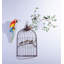 Décoration murale vintage en métal représentant un oiseau en forme de branche et de cage à oiseaux, idéale pour le salon ou la maison.