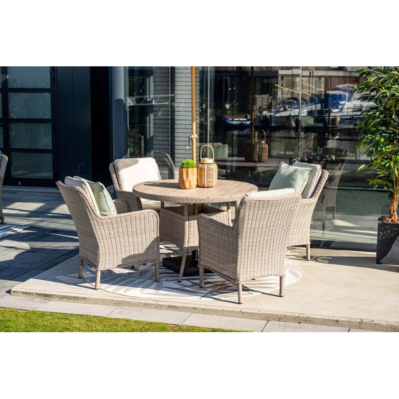 Burnvale 4 - Person Wicker Patio Dining Set with Round Table , Cushions Included