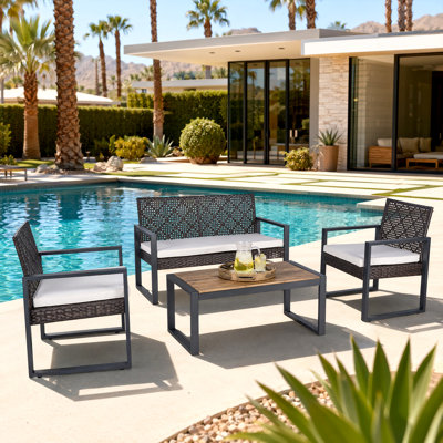 Ensemble de mobilier de patio 4 pièces avec table basse et coussin de siège