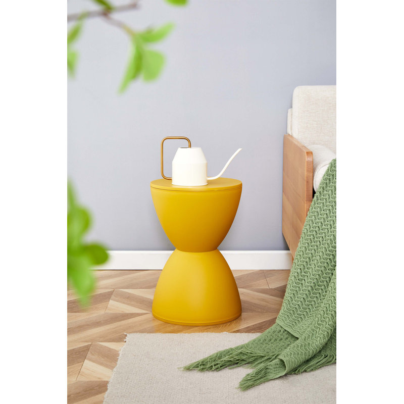 Compact and Stylish Yellow Plastic Side Table Stool, Perfect for Small Spaces and Modern Interiors.