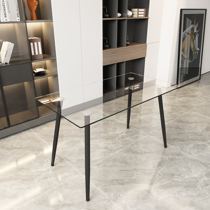 Table de salle à manger de 51,51 po en verre contemporain avec pieds en métal trempé et noir, pouvant accueillir 4 à 6 personnes confortablement pour les repas en famille.