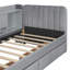 Lit de jour simple tapissier avec tiroirs, tablettes, armoires rabattables et table d'appoint