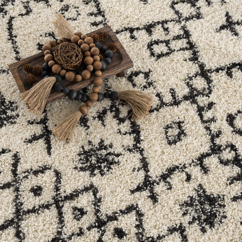 Tapis beige / noir à poils longs Adeen, Rond 7 pi 10 po