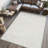 Yaniyah Classic Solid Low-Pile Machine-Washable Cream Rug-1039028497