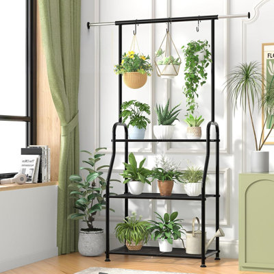 This Three-Tiered Heavy-Duty Metal Plant Stand Features A Minimalist Black Design And A Large Capacity, Accommodating Multiple Flower Pots. It
