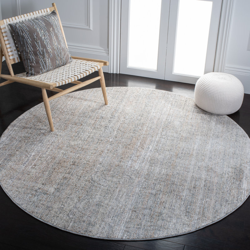 Tapis gris/beige, Rond 6 pi 7 po