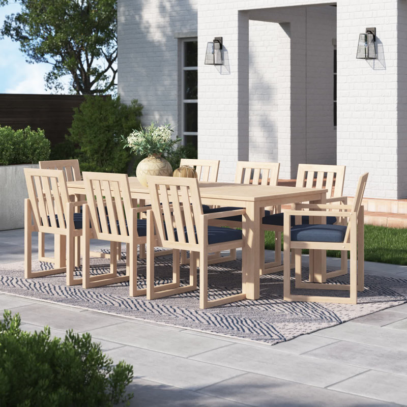 Sehrish Rectangular 8 - Person 87" Long Dining Set With Sunbrella Cushion Covers, Canvas Navy Sunbrella® Canvas